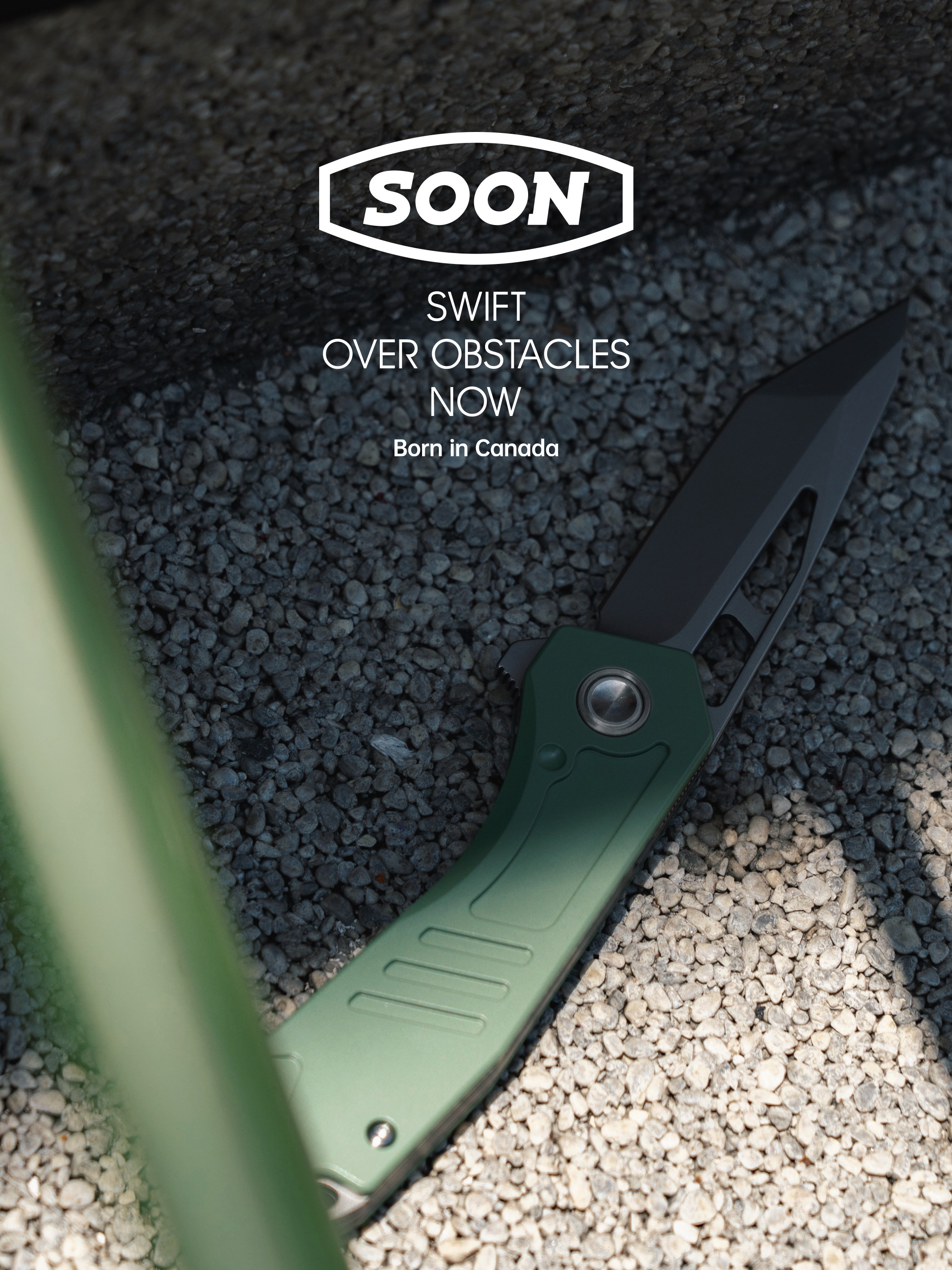 Green SOON knife in gravel